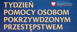 Plakat z niebieskim tłem i napisem Tydzień Pomocy Osobom Pokrzywdzonym Przestępstwem