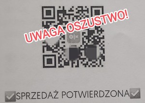 kod QR i napis Uwaga oszustwo