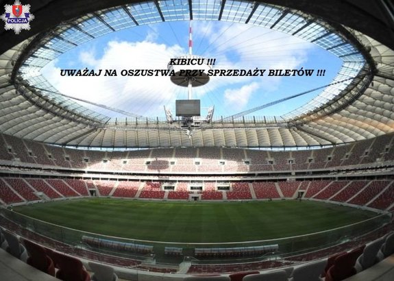 Zdjęcie stadionu piłkarskiego i napis kibicu uważaj na oszustwa przy sprzedaży biletów